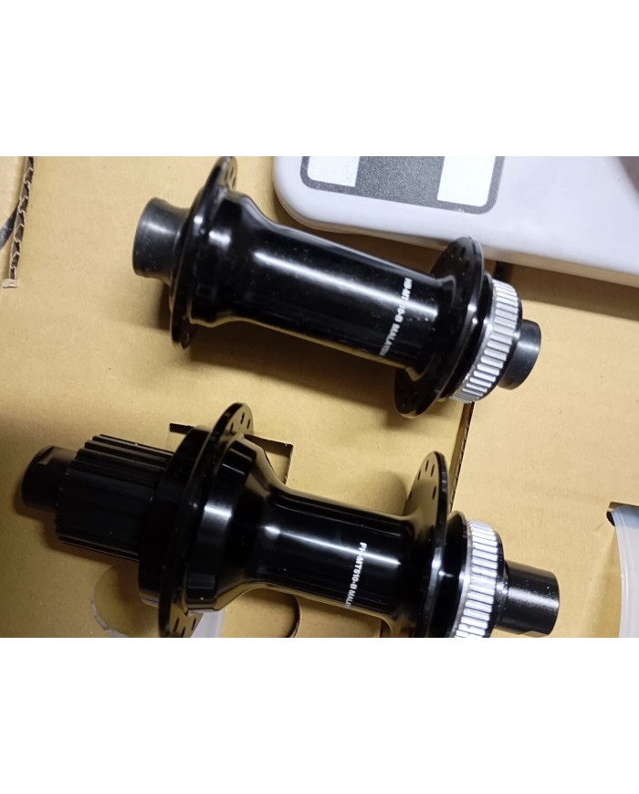 Coppia di mozzi mtb boost 15x110 12x148 a 32 fori per freno centerlock corpetto